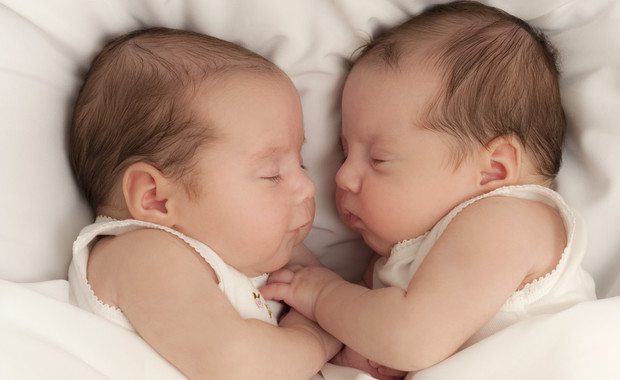 Newborn twins sleeping